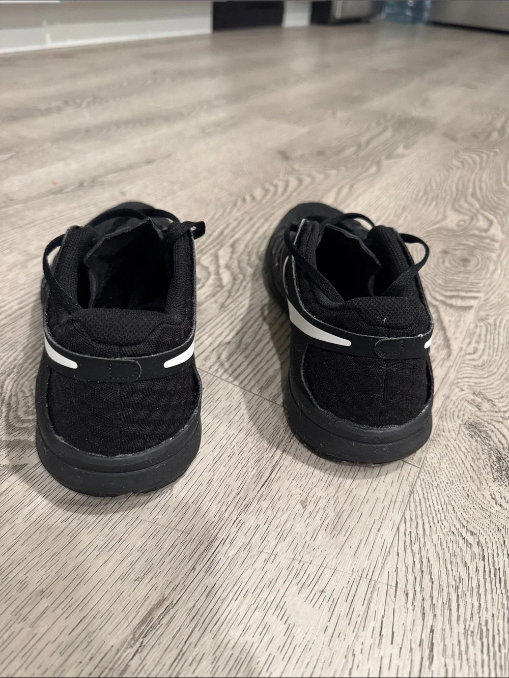 Nike Men’s Black Athletic Shoes with White Swoosh